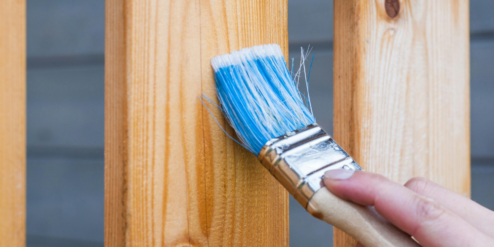 How Long Should You Wait Before Painting a Fence?
